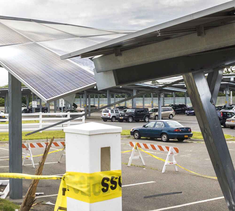 Damaged carport caused by vehicle colliding into it
